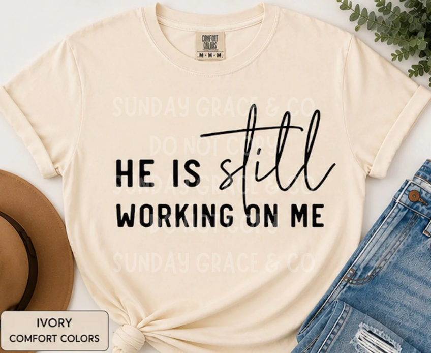 He Is Still Working On Me | Comfort Colors® Tee